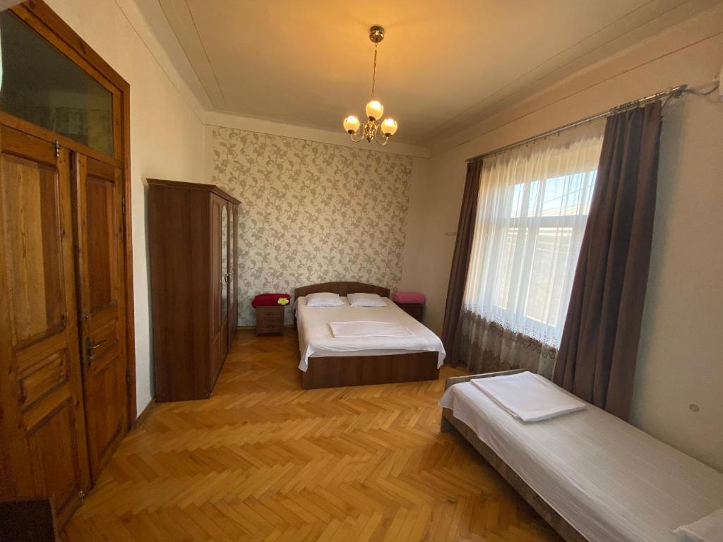 Postel nebo postele na pokoji v ubytování Valiko house in Telavi