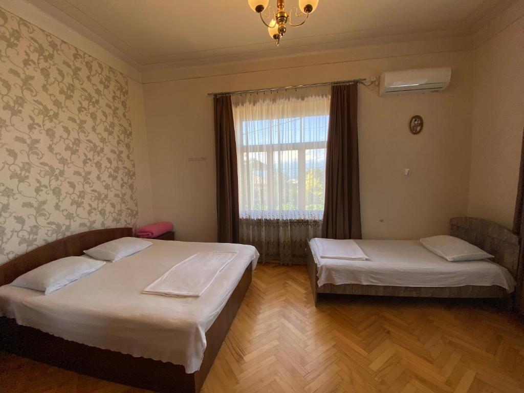 Postel nebo postele na pokoji v ubytování Valiko house in Telavi