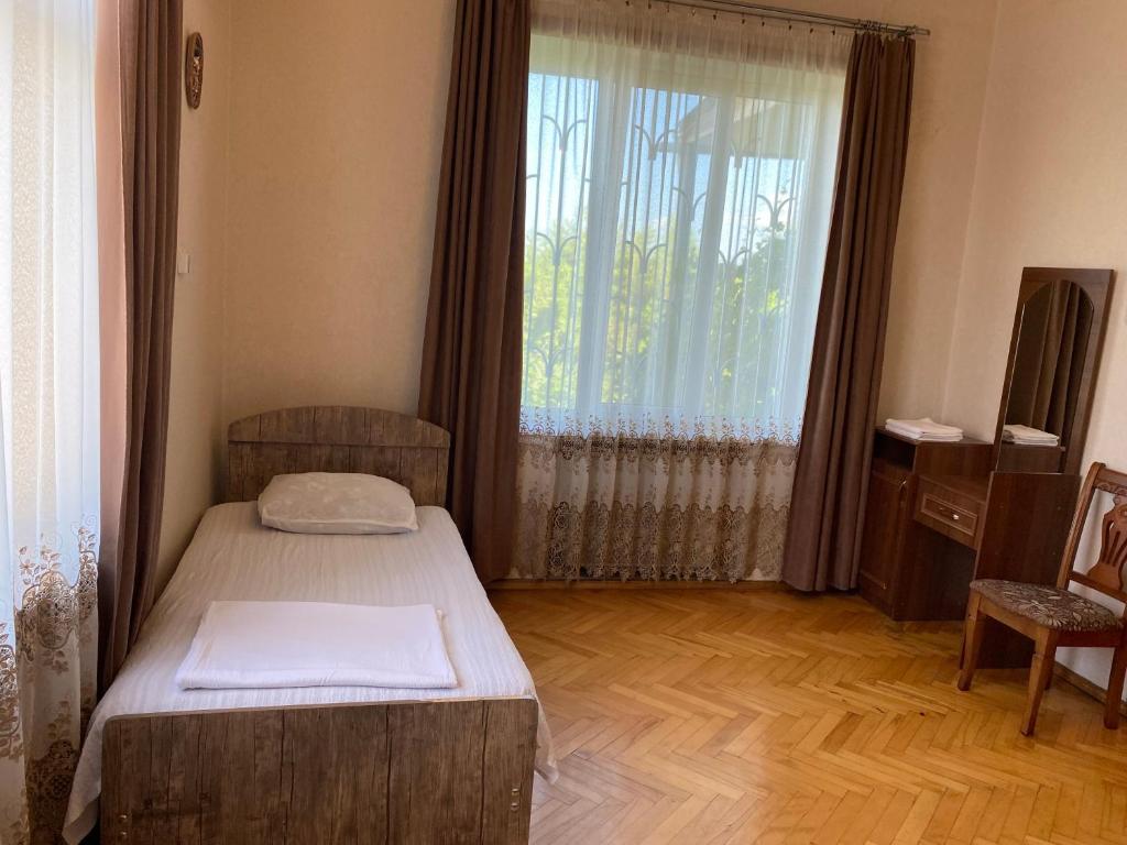 Postel nebo postele na pokoji v ubytování Valiko house in Telavi