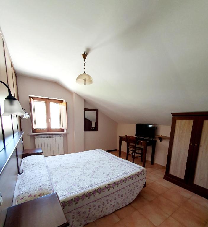 Postel nebo postele na pokoji v ubytování Albergo del Sangro