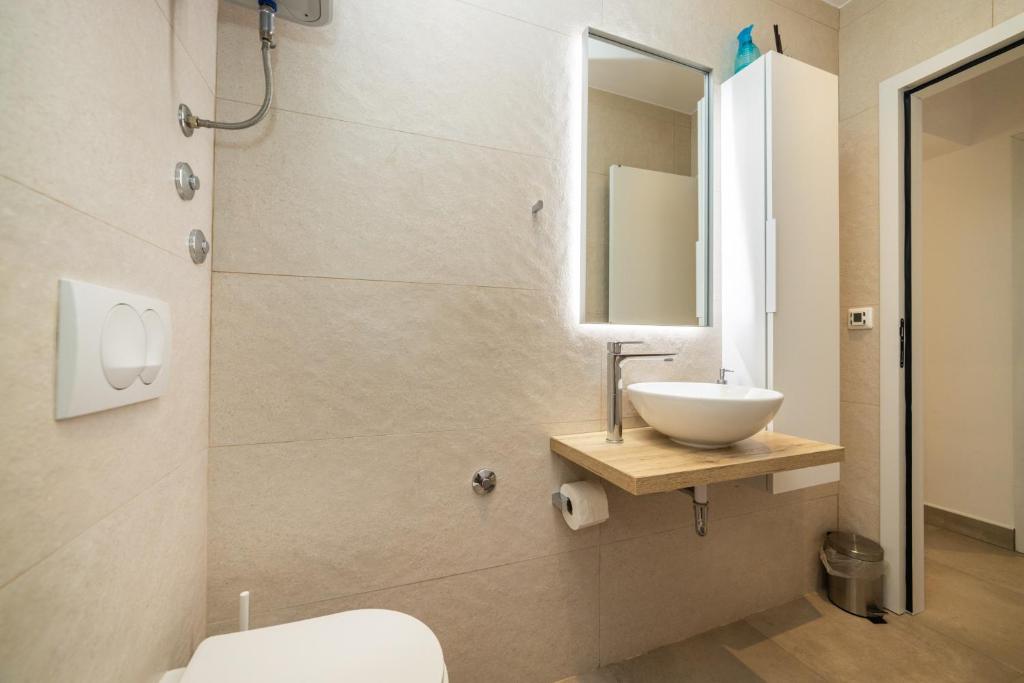 Koupelna v ubytování Apartments Ema