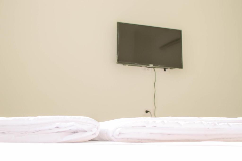 Postel nebo postele na pokoji v ubytování TETE Homestay