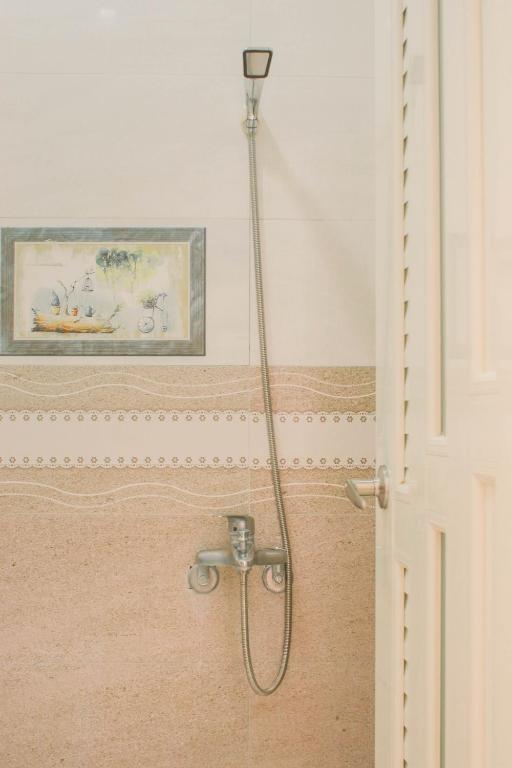 Koupelna v ubytování TETE Homestay