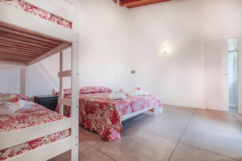 Postel nebo postele na pokoji v ubytování Residenza Anna Calabria