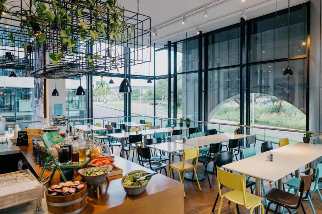 Een restaurant of ander eetgelegenheid bij Hotel Casa Amsterdam