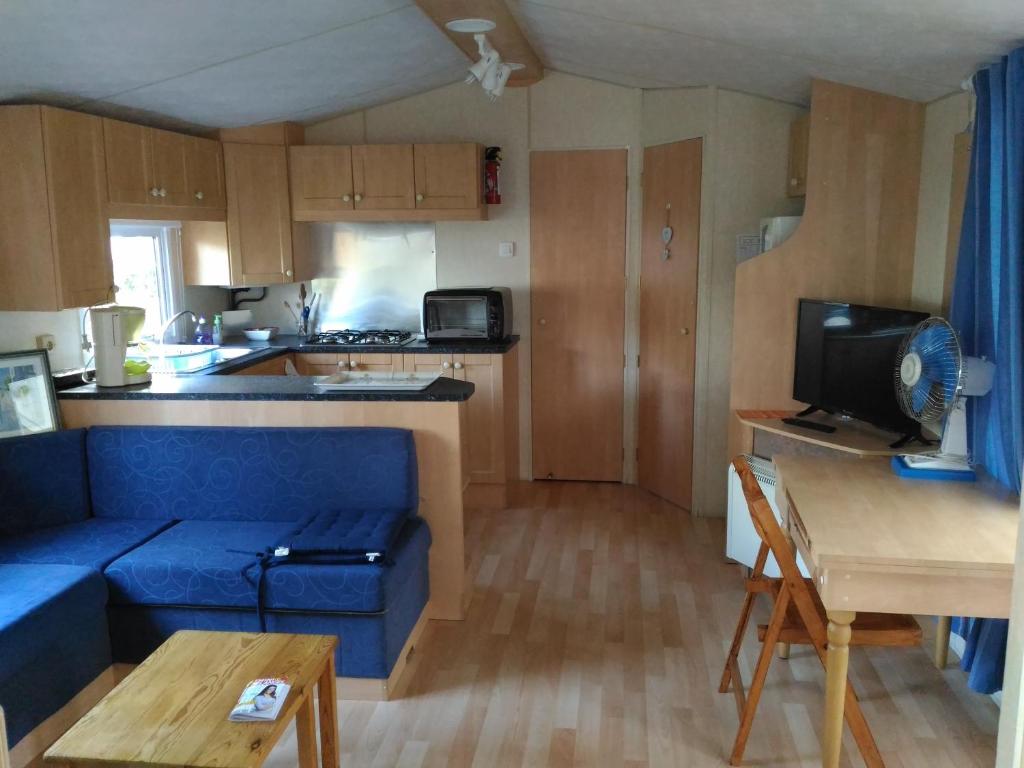 Kuchyň nebo kuchyňský kout v ubytování Bungalow Vacances