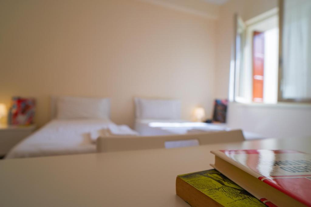 Postel nebo postele na pokoji v ubytování Casa dello Studente