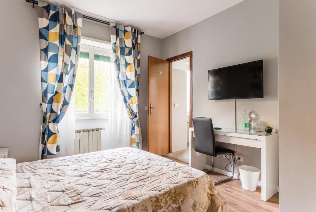 Postel nebo postele na pokoji v ubytování Amelia 5