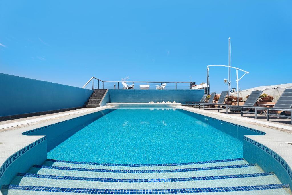 Bazén v ubytování La Calabacera Casa Verde con piscina, By Paramount Holidays nebo v jeho okolí