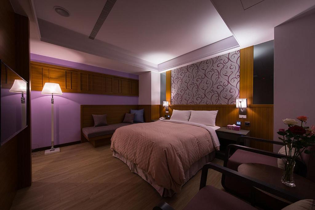 Postel nebo postele na pokoji v ubytování Sir Motel - Sanchong