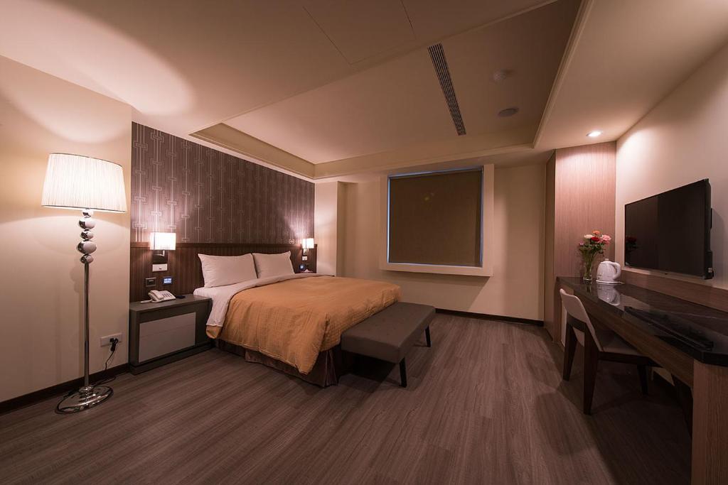 Postel nebo postele na pokoji v ubytování Sir Motel - Sanchong