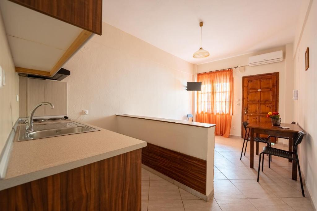 Kuchyň nebo kuchyňský kout v ubytování Effie Rooms