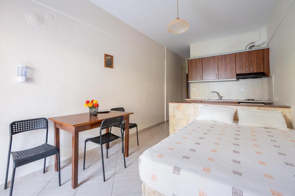 Postel nebo postele na pokoji v ubytování Effie Rooms