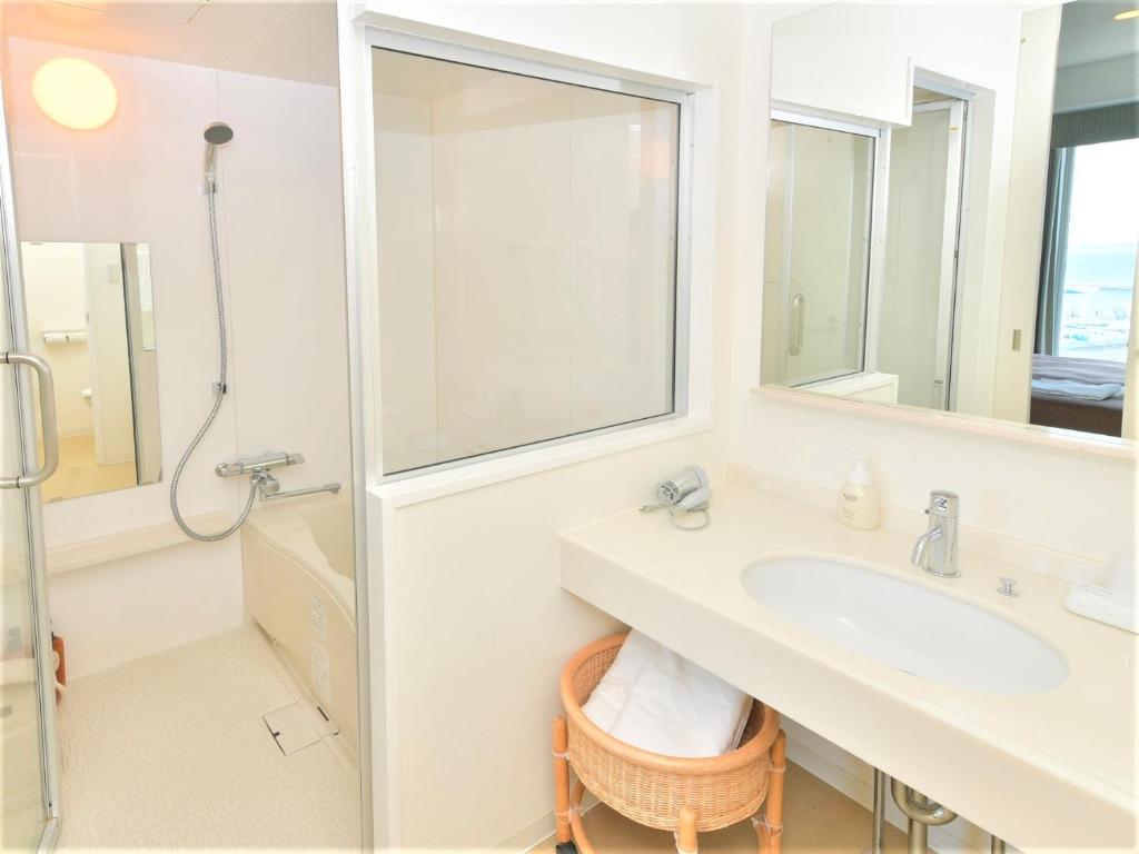 Koupelna v ubytování J Hotel Rinku