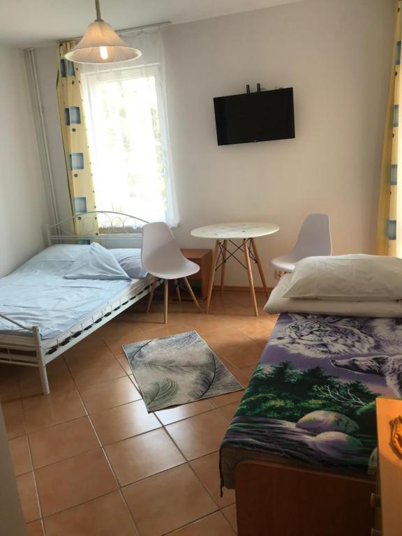 Postel nebo postele na pokoji v ubytování Dom Jana