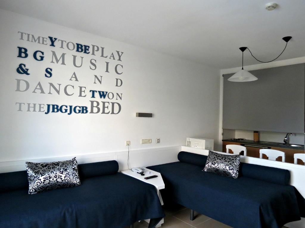 A bed or beds in a room at BG Pamplona