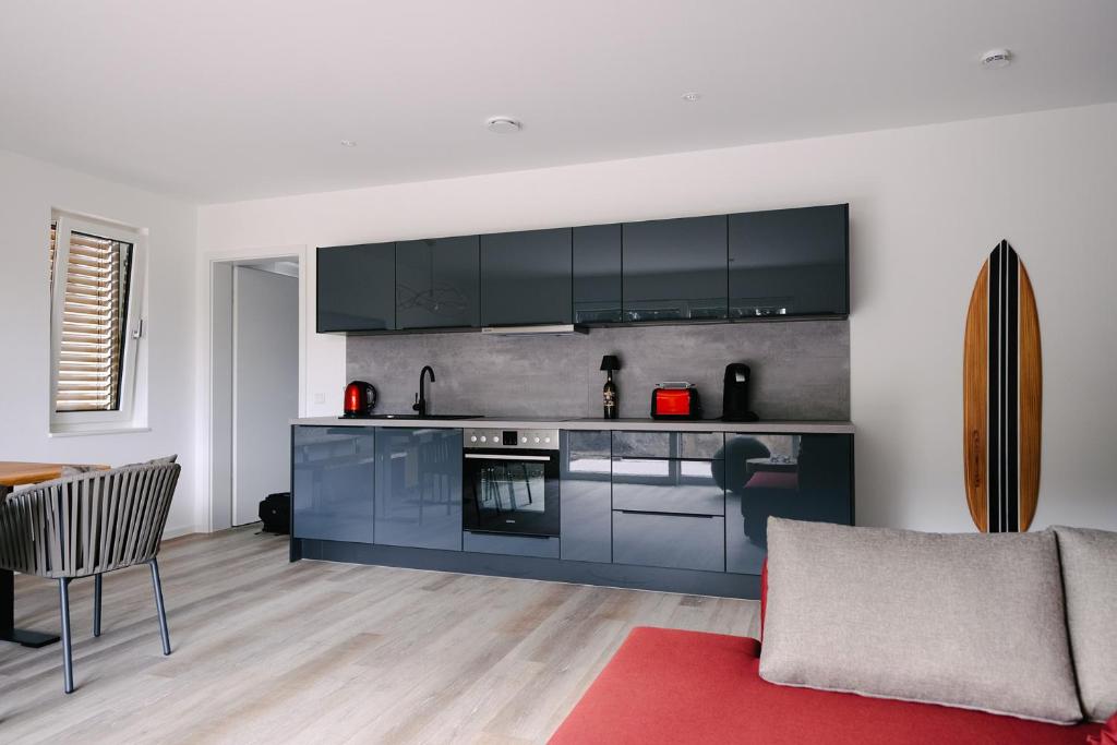 Kuchyň nebo kuchyňský kout v ubytování Ferienapartments Seepark Möhnesee