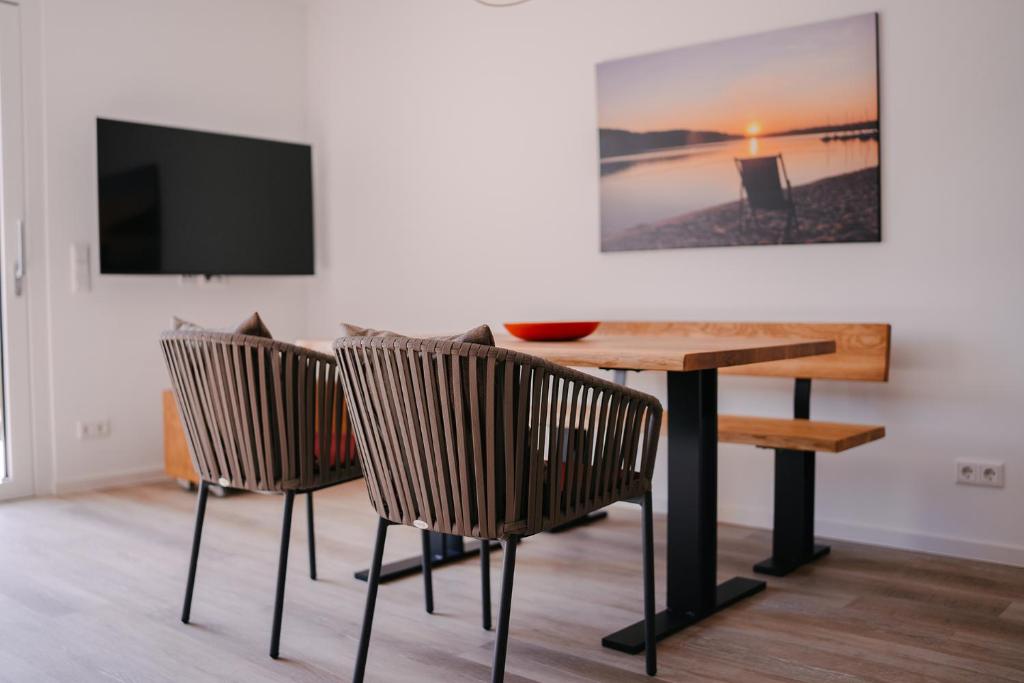 TV a/nebo společenská místnost v ubytování Ferienapartments Seepark Möhnesee