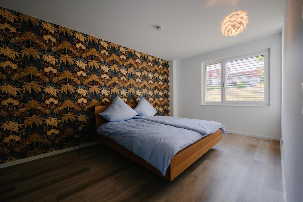 Postel nebo postele na pokoji v ubytování Ferienapartments Seepark Möhnesee