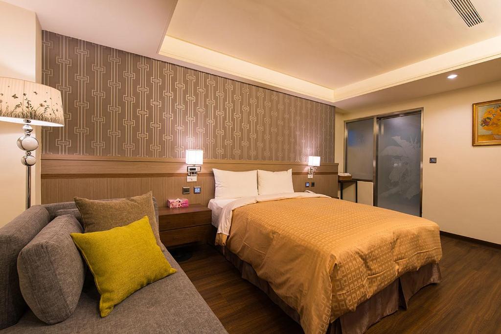 Postel nebo postele na pokoji v ubytování Sir Motel - Sanchong