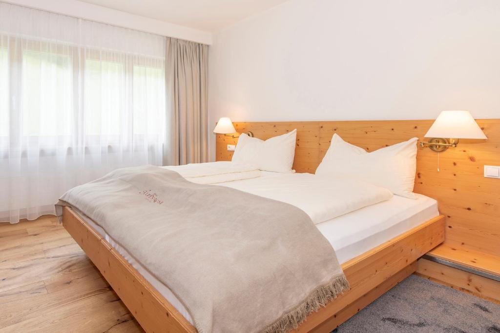 Postelja oz. postelje v sobi nastanitve Hotel Alpenrose