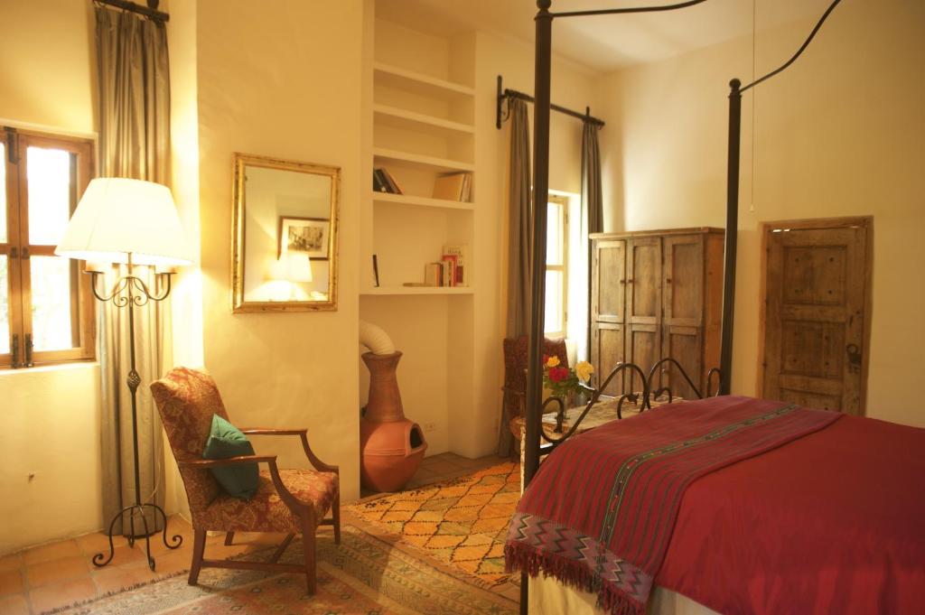 Postel nebo postele na pokoji v ubytování Casa Mision de San Miguel