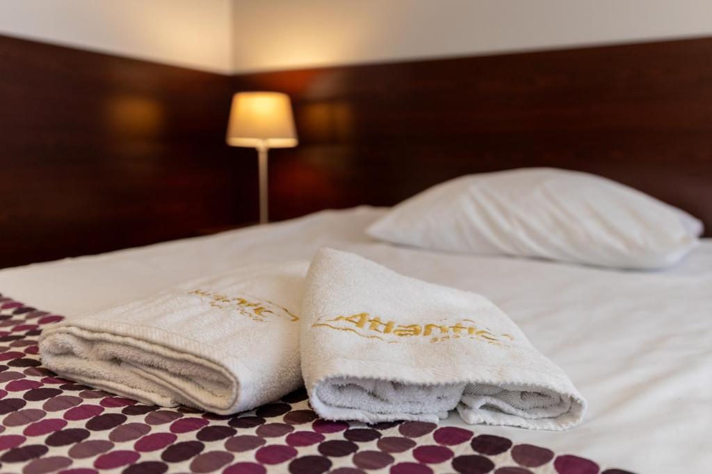 Posteľ alebo postele v izbe v ubytovaní Atlantic Aparthotel