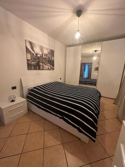 Postel nebo postele na pokoji v ubytování Indomabile Home Como