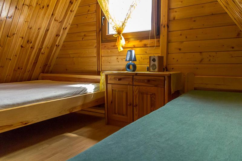 Postel nebo postele na pokoji v ubytování Pod Szklaną Wydmą