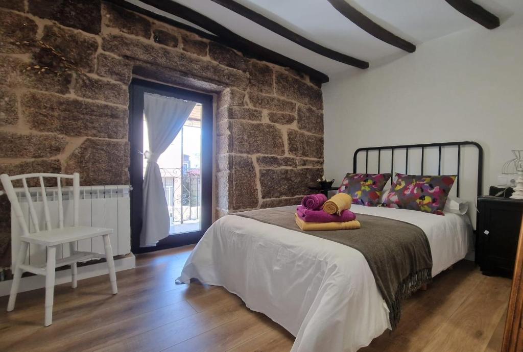 Postel nebo postele na pokoji v ubytování Casa da Penela