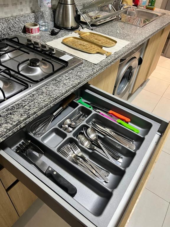 Kuchyň nebo kuchyňský kout v ubytování CHIC & COZY appartement très calme