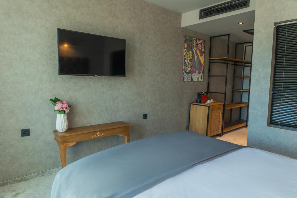 A television and/or entertainment centre at The LODGE Hotel