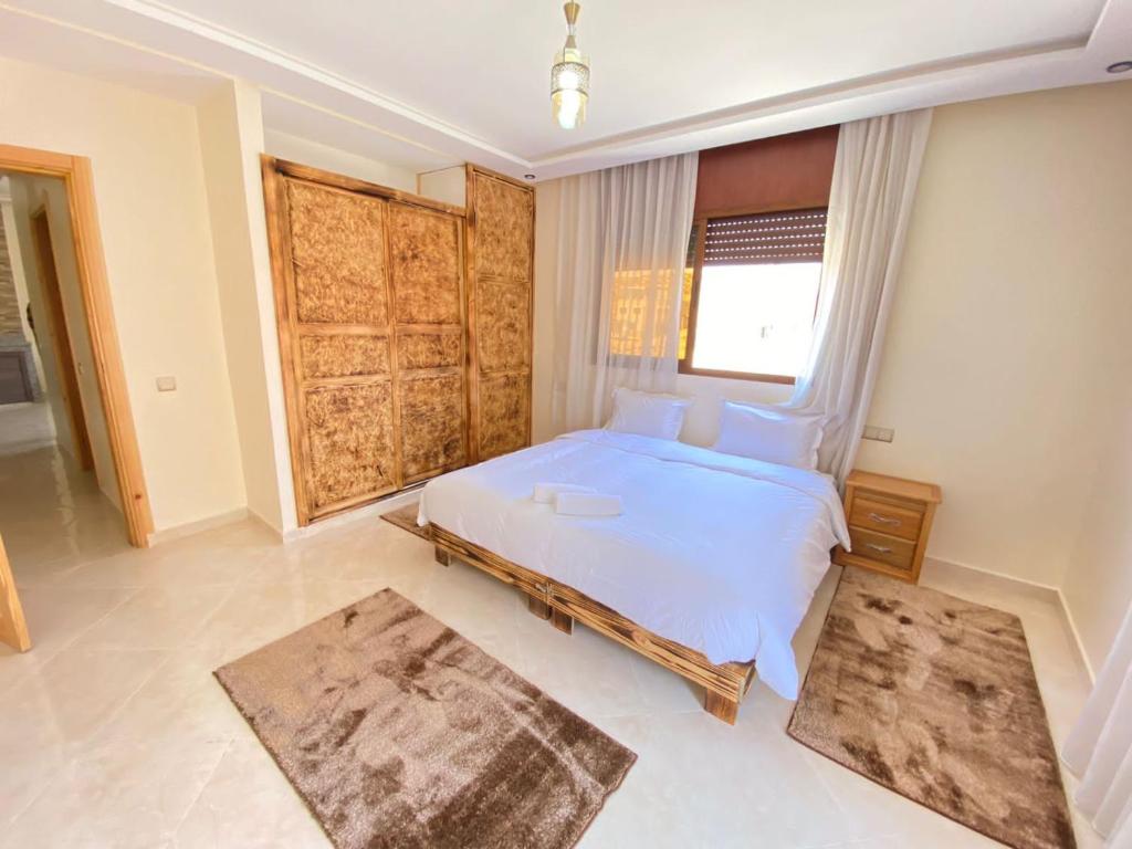 Postel nebo postele na pokoji v ubytování Auberge golden wave imsouane