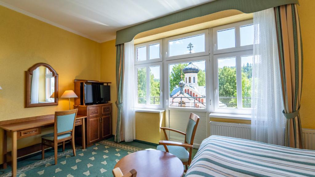 TV a/nebo společenská místnost v ubytování Hotel Richard Spa & Wellness