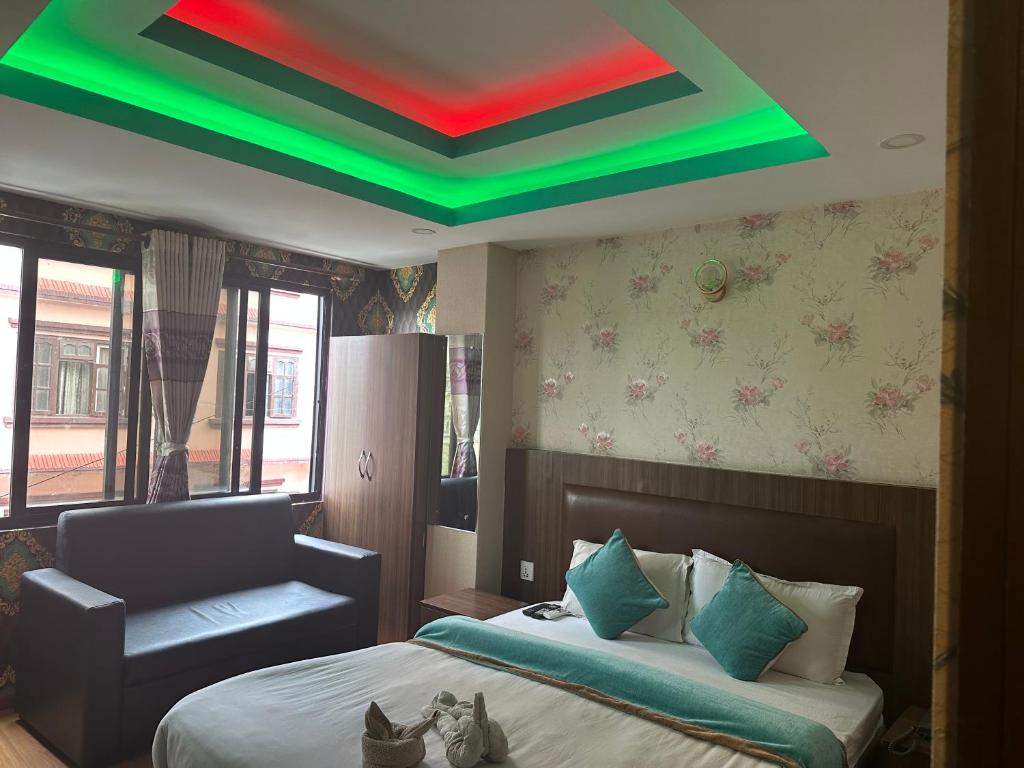 Postel nebo postele na pokoji v ubytování HOTEL PARAMI INN