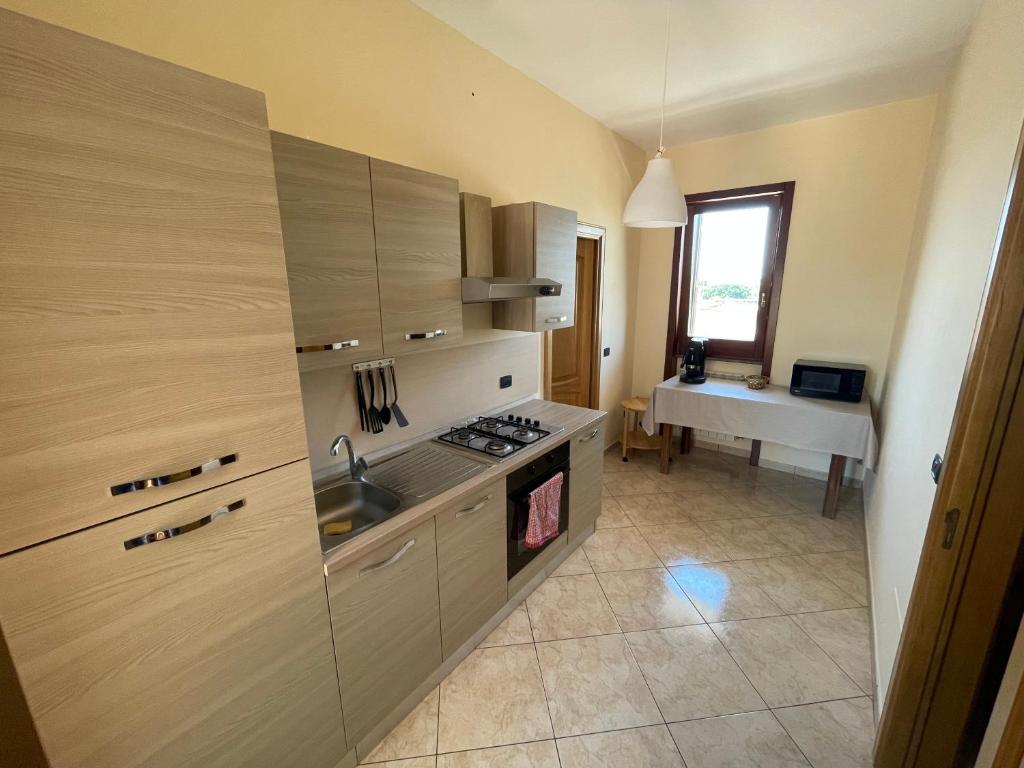 Kuchyň nebo kuchyňský kout v ubytování Casa Leonardo