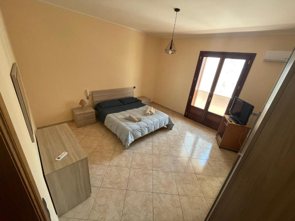 Postel nebo postele na pokoji v ubytování Casa Leonardo