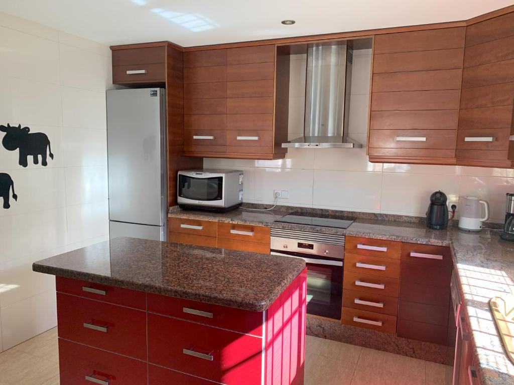 Kuchyň nebo kuchyňský kout v ubytování Penthouse - residence La Mina - Albir avec WIFI GRATUIT