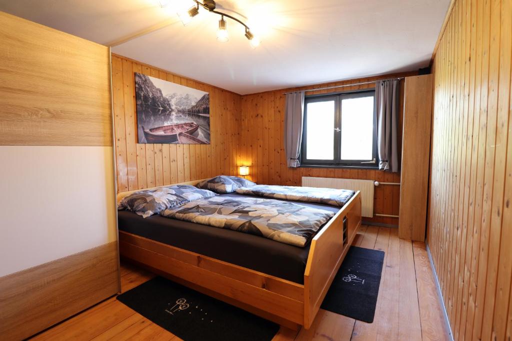 Postel nebo postele na pokoji v ubytování Hus8 Krumbach