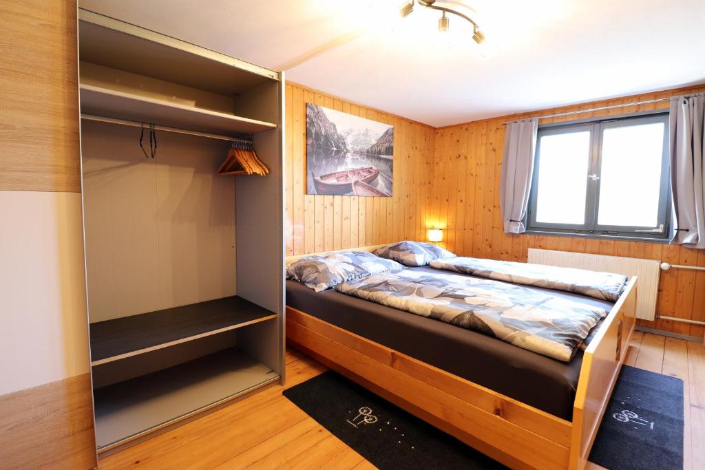 Postel nebo postele na pokoji v ubytování Hus8 Krumbach