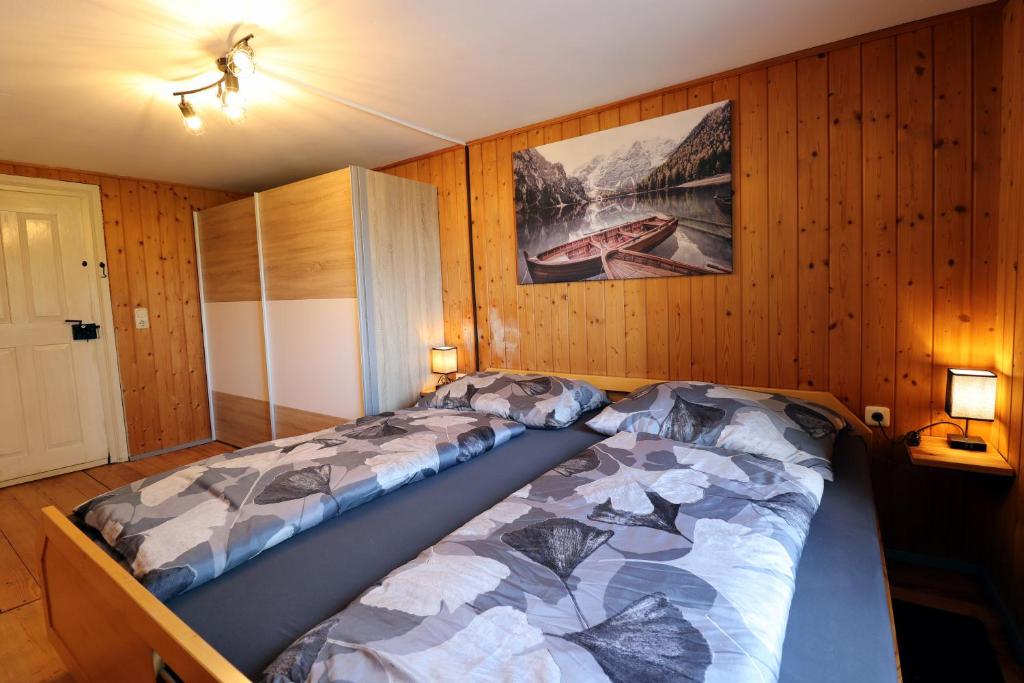 Postel nebo postele na pokoji v ubytování Hus8 Krumbach