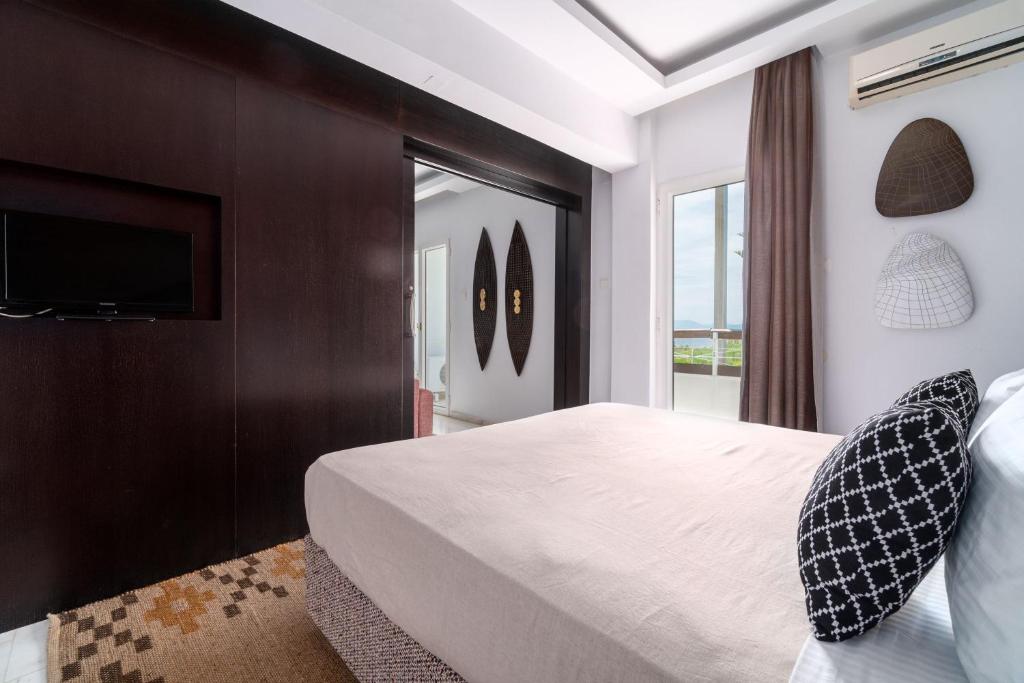 Photo de la galerie de l'établissement Arco Beach Hotel, à Agia Paraskevi