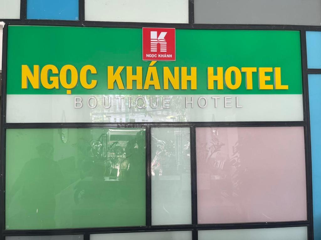 a sign for a hospoc kham hotel on a building at Ngoc Khanh hotel in Nha Trang