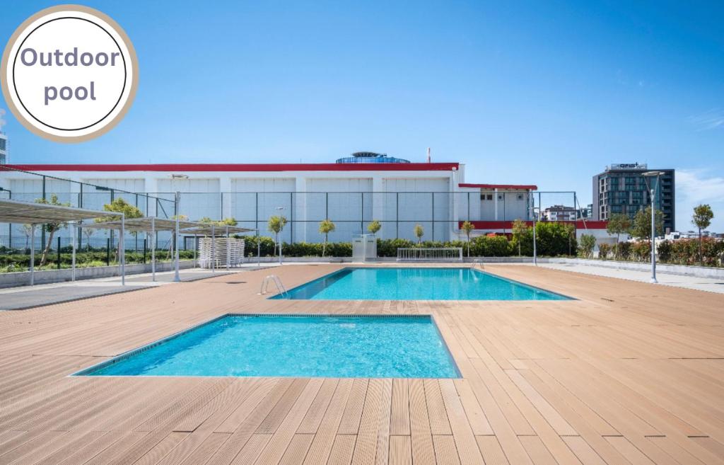 a swimming pool on the roof of a building at 4 bedroom rental unit with pool/middle of Bursa in Nilüfer