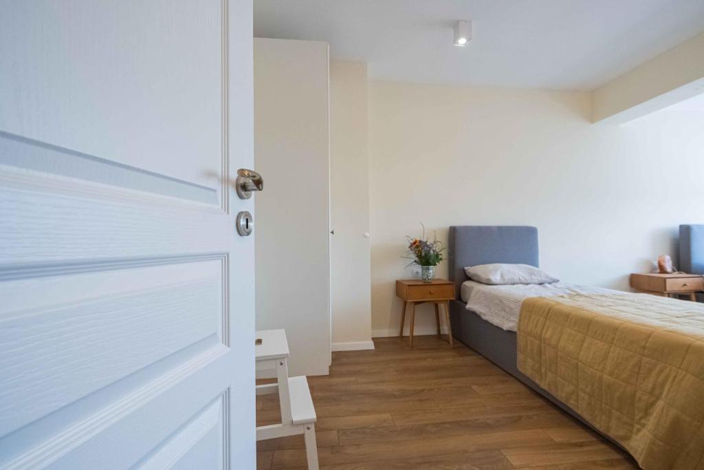 Postel nebo postele na pokoji v ubytování Central DELUXE Apartment