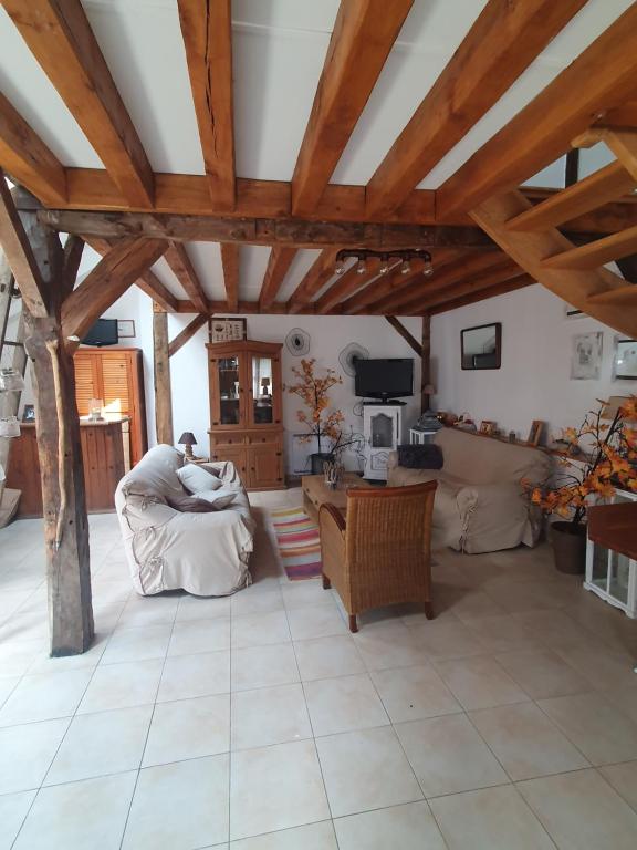 Posezení v ubytování Maison spacieuse