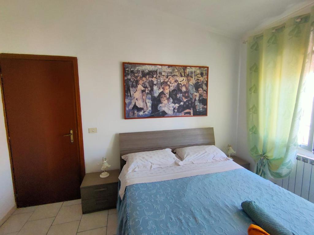 Postel nebo postele na pokoji v ubytování Nomentum House