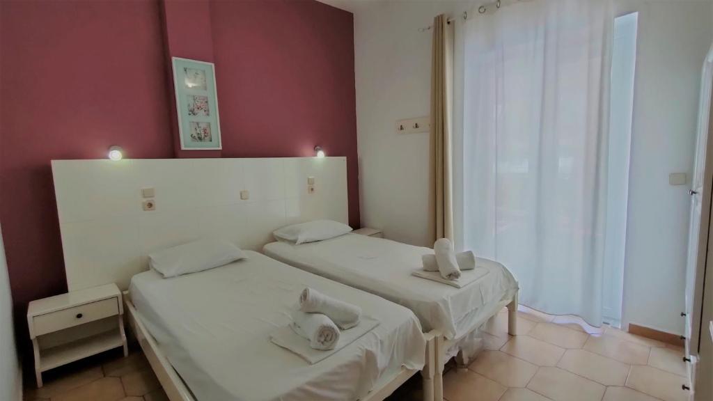 Postel nebo postele na pokoji v ubytování Jiovanni