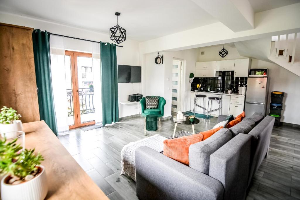 Kuchyňa alebo kuchynka v ubytovaní Apartamenty Dwupoziomowe Na Dwa Widoki z Jacuzzi & Sauna