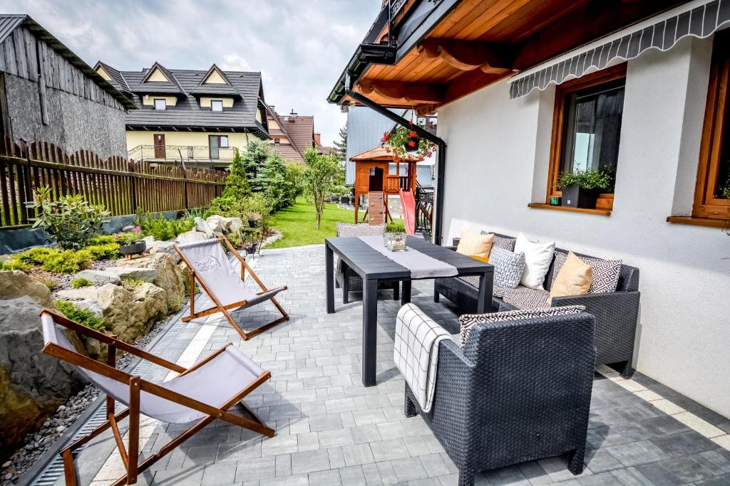Posedenie v ubytovaní Apartamenty Dwupoziomowe Na Dwa Widoki z Jacuzzi & Sauna